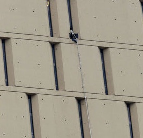 A rope dangles from a window on the back side of the Metropolitan Correctional Center in Chicago where  inmates Jose Banks and Kenneth Conley escaped