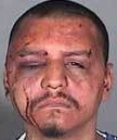 Gabriel Carrillo - beaten up by Sgt. Eric Gonzalez in the LA County jail - He bragged about the beating and email this photo to a cop friend of his saying Looks like we did a better job, Where's my beer big homie